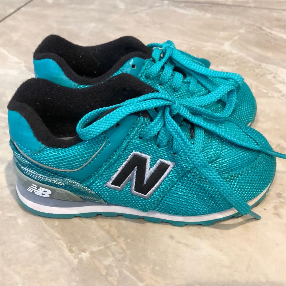 New teal New Balance sneakers
